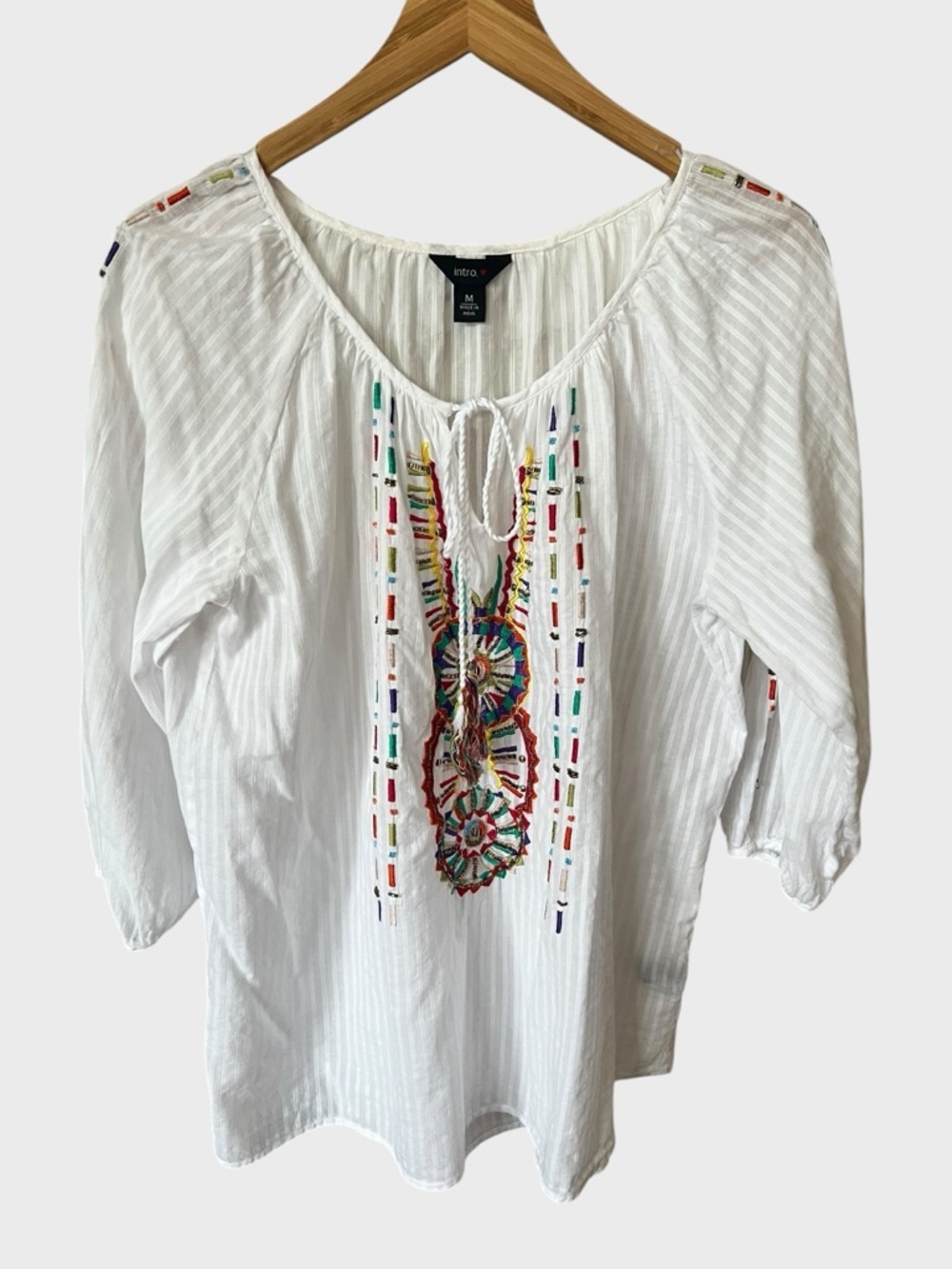 Intro embroidered peasant top.